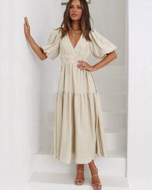 Claudia® | Ruffle midi dress with V-neck and puff sleeves