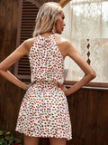 Nerina® | Halterneck midi dress with polka dots