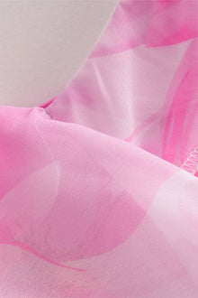 Adriana® | Backless ruffle dress