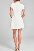 Leslie® | Exquisite and playful mini dress made of tweed fabric with beaded trim, short sleeves and pockets
