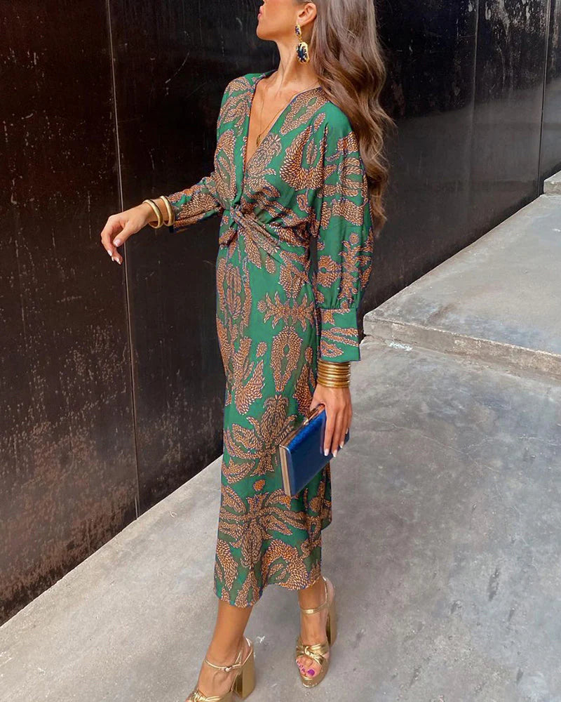 Claudia® | Elegant long-sleeved dress with floral print