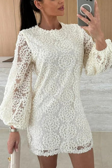 Kimberly® | Loose mini dress with balloon sleeves made from lace-textured fabric