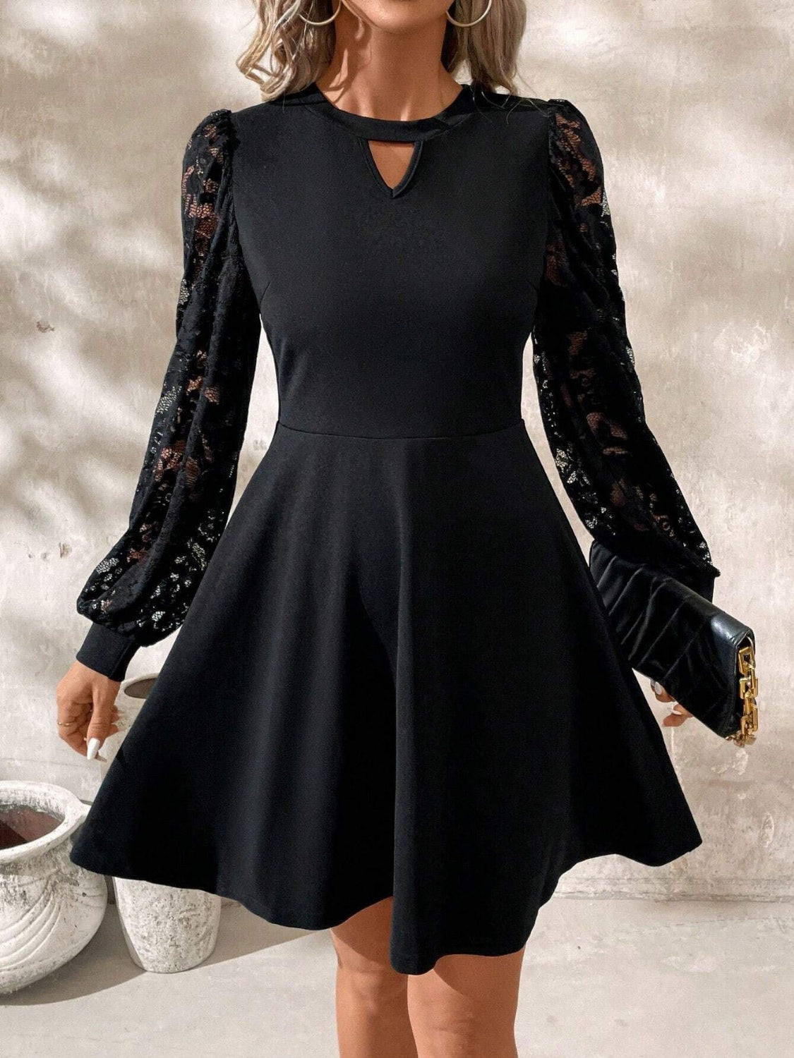 Reina® | Long sleeve lace mini dress with cutouts