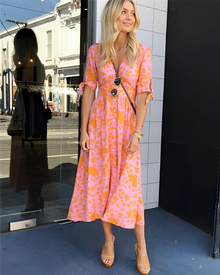 Odalis® | Elegant dress with a bright orange print