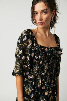 Ariadna® | Printed midi dress with ruched bodice and ruffles