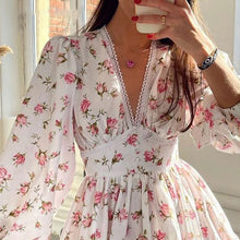 Emery® | Short floral dress with V-neck